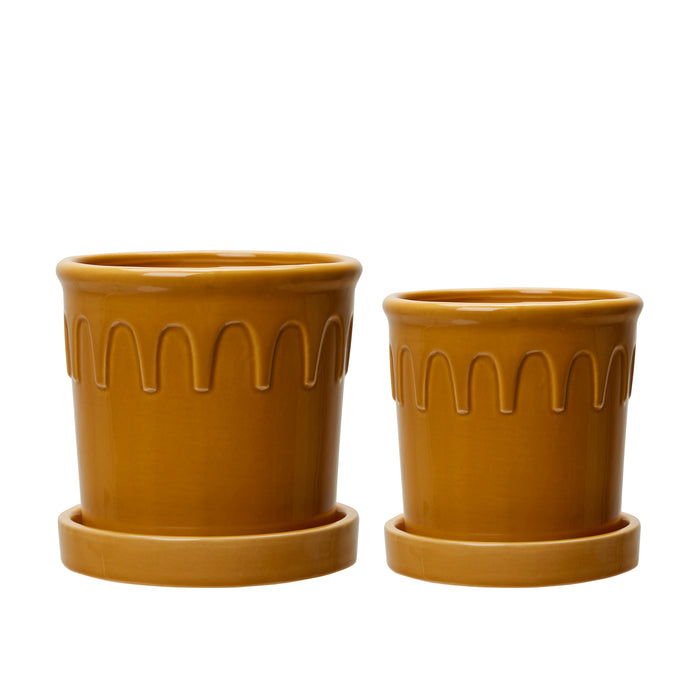 Oat-coloured ceramic Lykke pots with matching saucers by Wikholmform