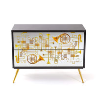 Artistic two-drawer chest with surreal trumpet imagery by Seletti