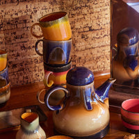 stack of colourful handled coffee mugs from hkliving design house