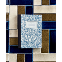 House Doctor botanical notebook on tiled surface