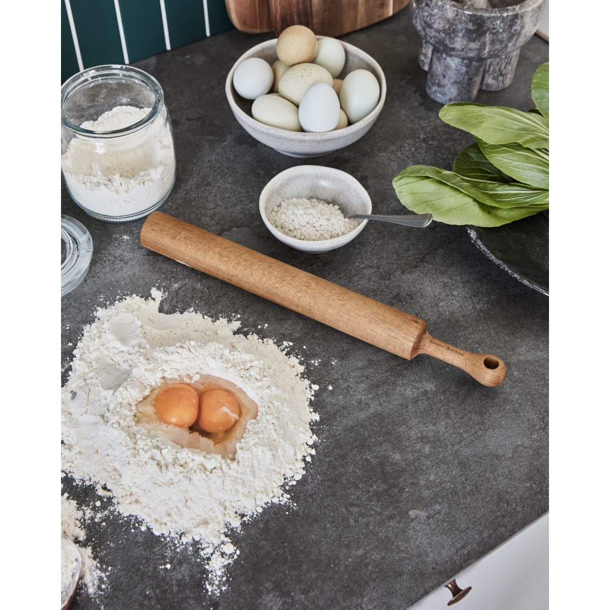 Eya rolling pin by House Doctor on kitchen counter with flour and eggs – baking tool from North Home