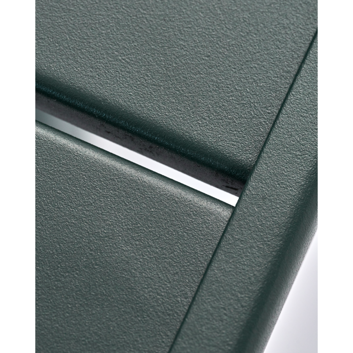 Close-up of House Doctor’s green Helo table – perfect for patios or balconies