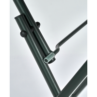 Close-up of matte green finish on House Doctor folding table frame
