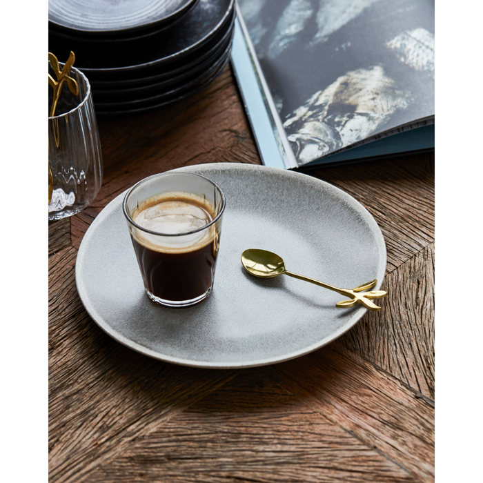 Decorative gold teaspoon on saucer with espresso – North Home coffee accessories