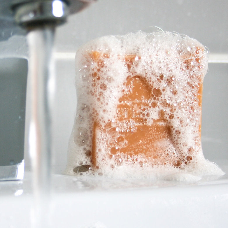 Natural golden soap bar with turmeric and essential oils