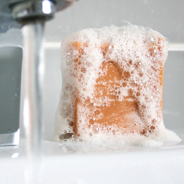 Natural golden soap bar with turmeric and essential oils