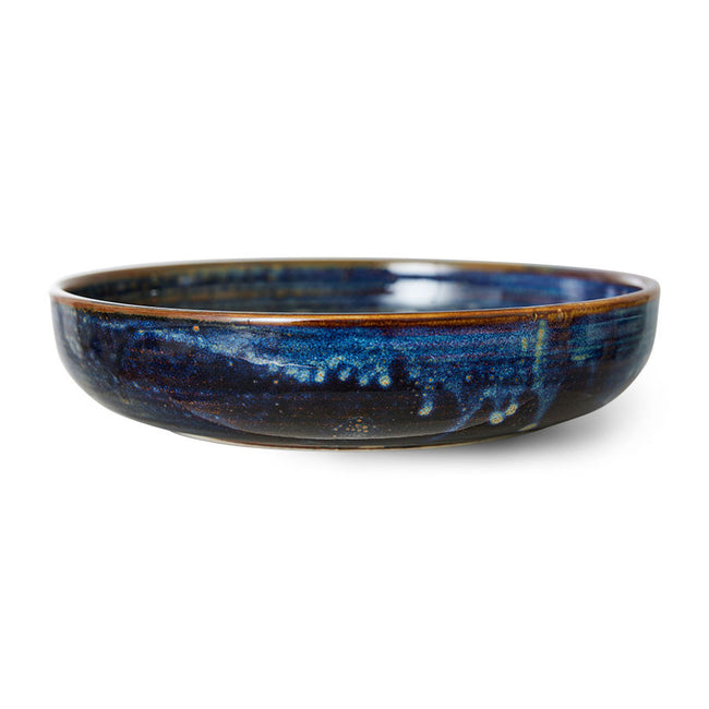 deep almost mystical blues swirl and drip down the sides of this deep sided plate from hkliving
