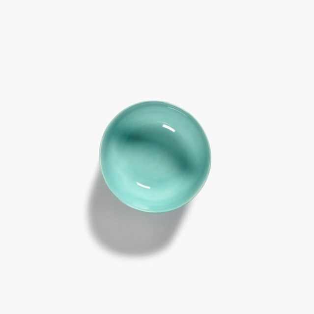 looking down into a shimmering azure blue bowl from the serax ottalenghi feast range