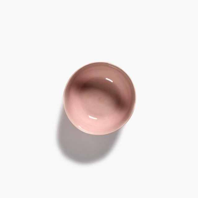 looking to a pool of a glmmering pink bowl in classic serax quality from ottolenghi