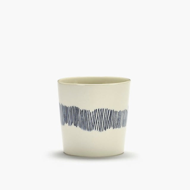 off white with black sstripes running down the side of theis straight sided coffee cup by ottolenghi