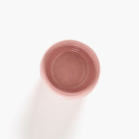 insid eof this pink crockery from the ottolenghi range with a high shine