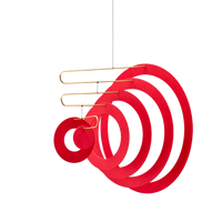 looking almost like rings making up the form of a megaphone a mobile by flensted handmade in denmark gives life and vibrancy to a space