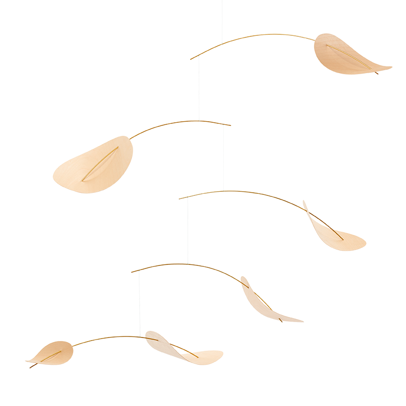 like leaves gently blowing in the wind this handmade mobile in light wood gently moves