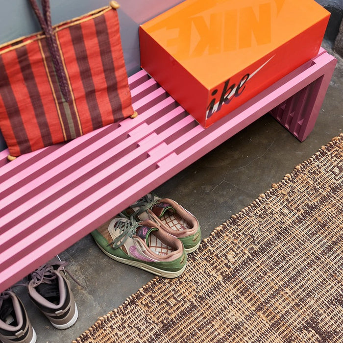Extra-long pink accent bench for bold entryways and hallways by hkliving