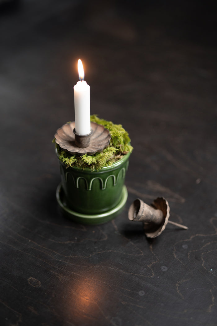 Set of 3 glossy green indoor planters styled with foliage and a candle