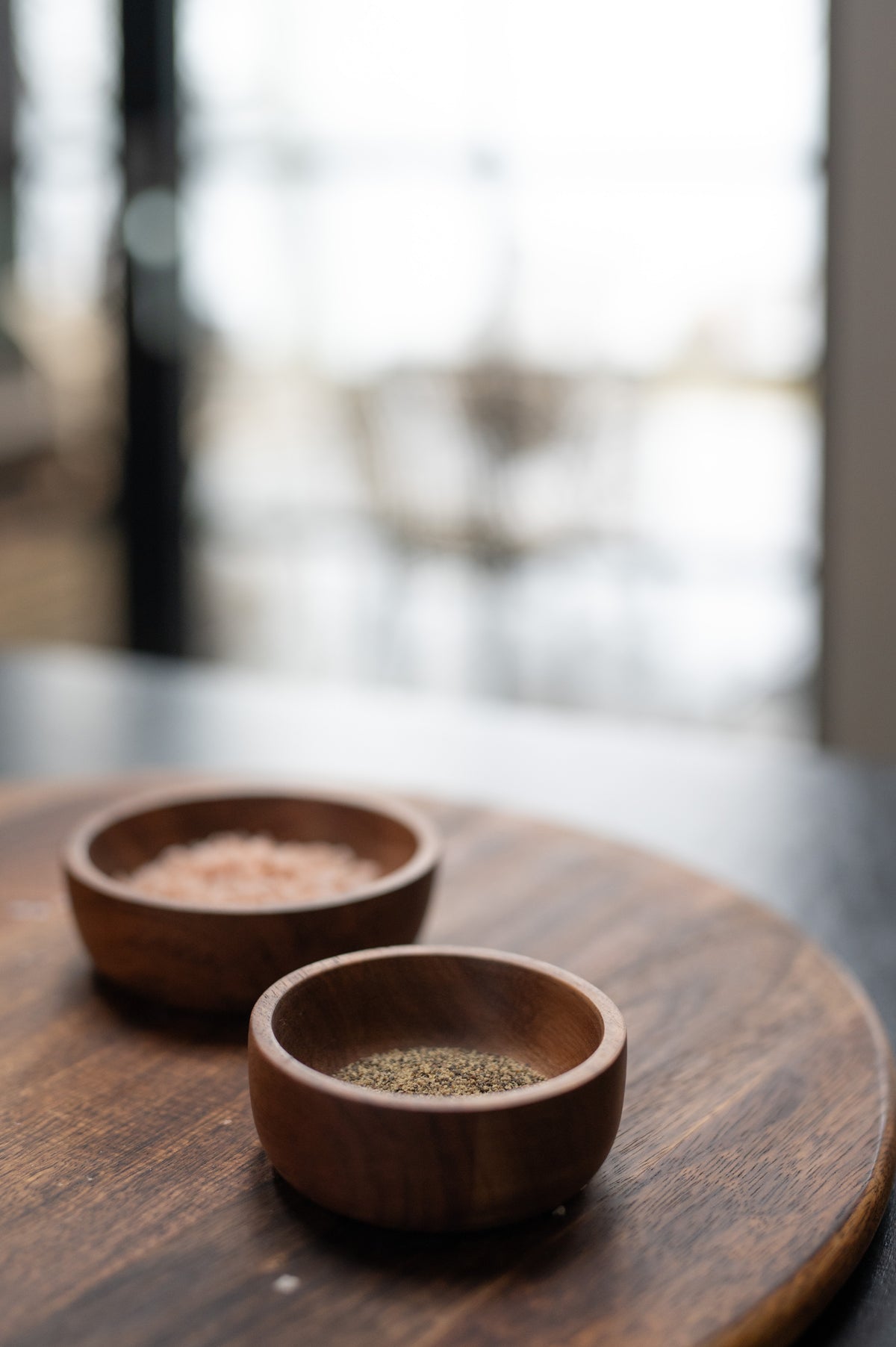 antique-finished wooden boards with rounded corners used for food presentation