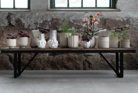 Lindsay Vases in small and large styled on rustic bench iwth other vases and planters from the same range
