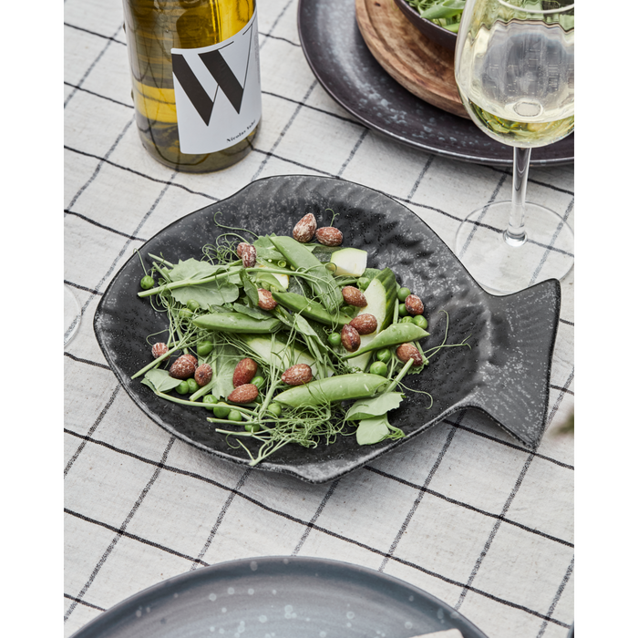 Handcrafted fish-shaped dish for serving vegetables or snacks