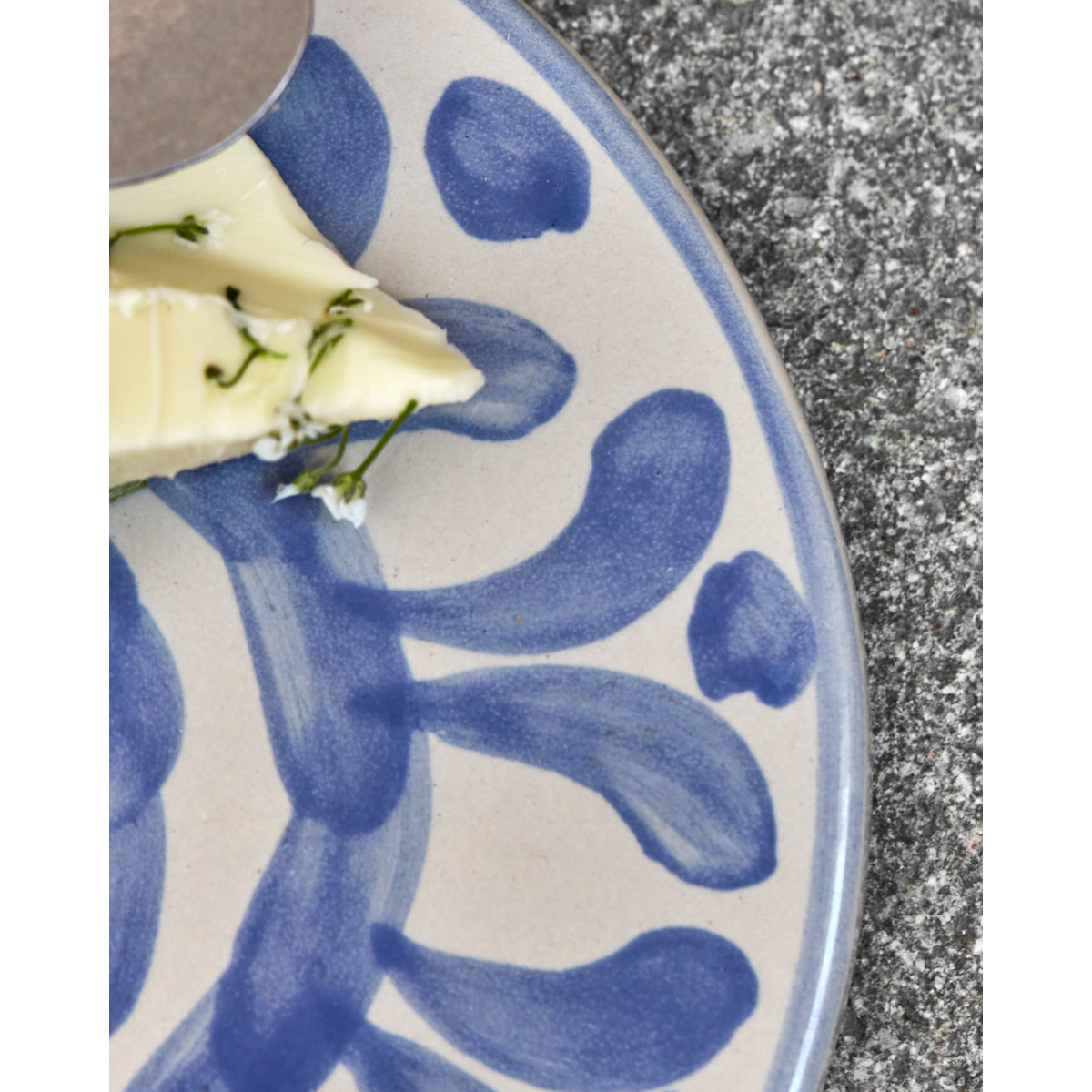 Close-up of brushstroke blue pattern on ceramic surface