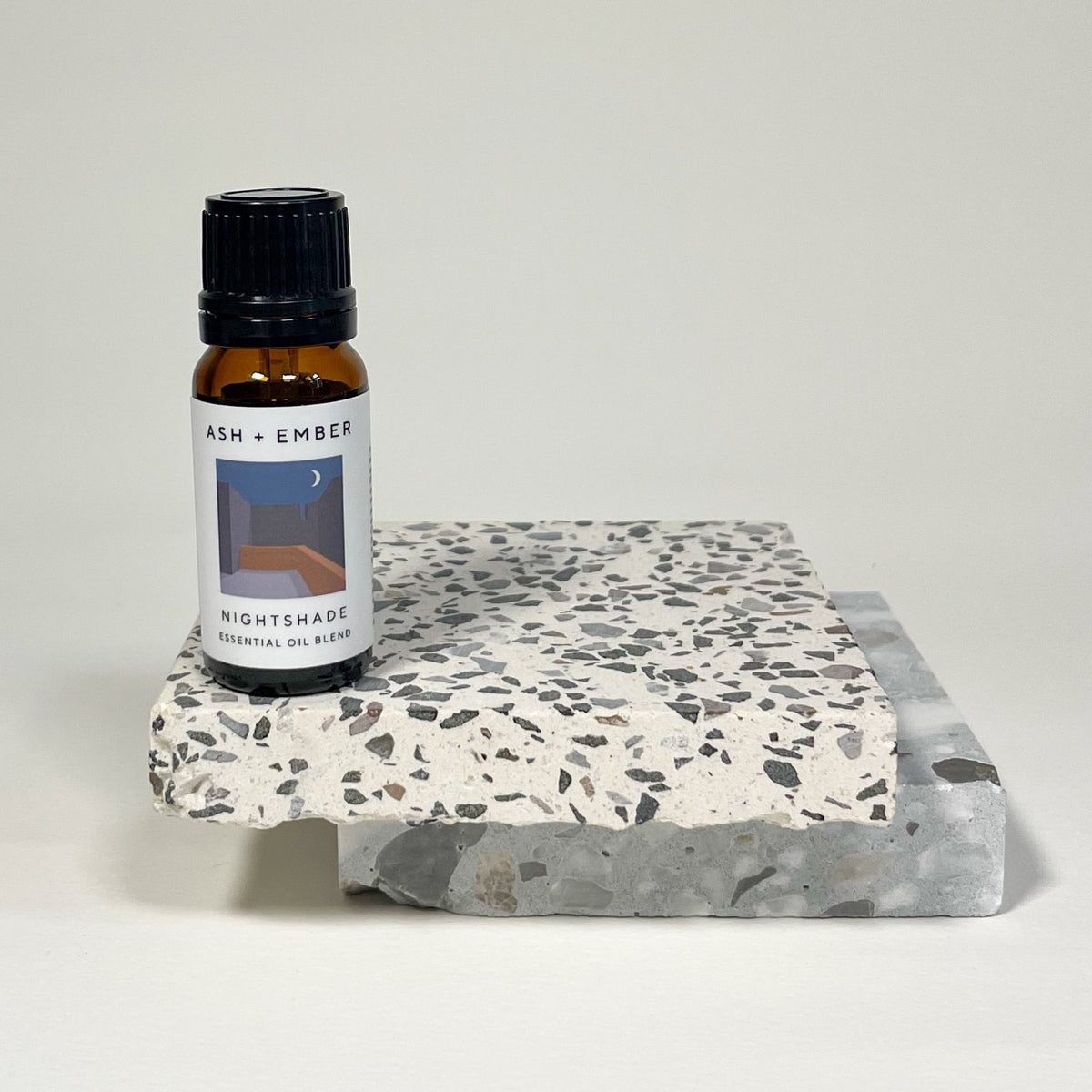 Nightshade Essential Oil Blend by Ash + Ember in 10ml amber glass bottle