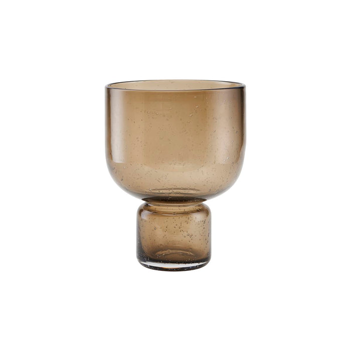 Rounded amber-toned vase on neutral background