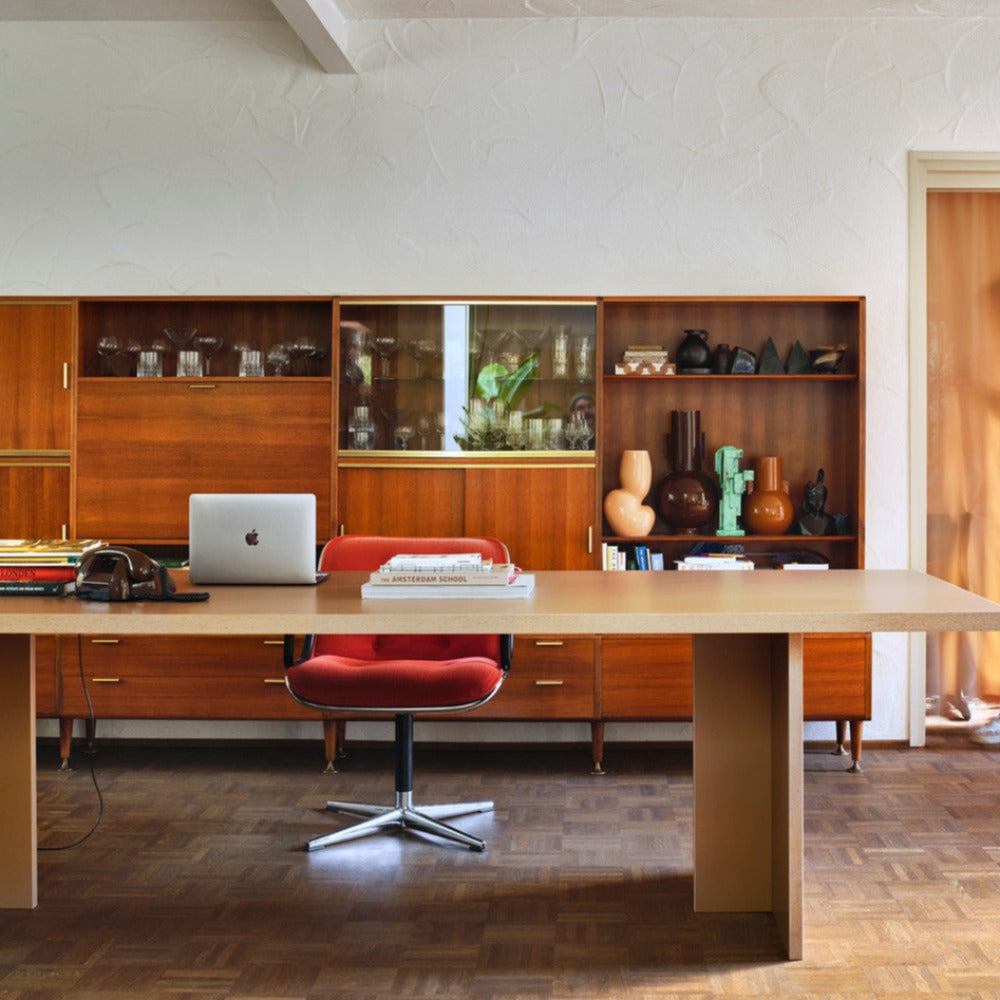 office room set up with hkliving vases in the background in many colours