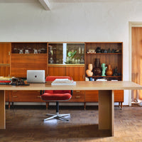 office room set up with hkliving vases in the background in many colours