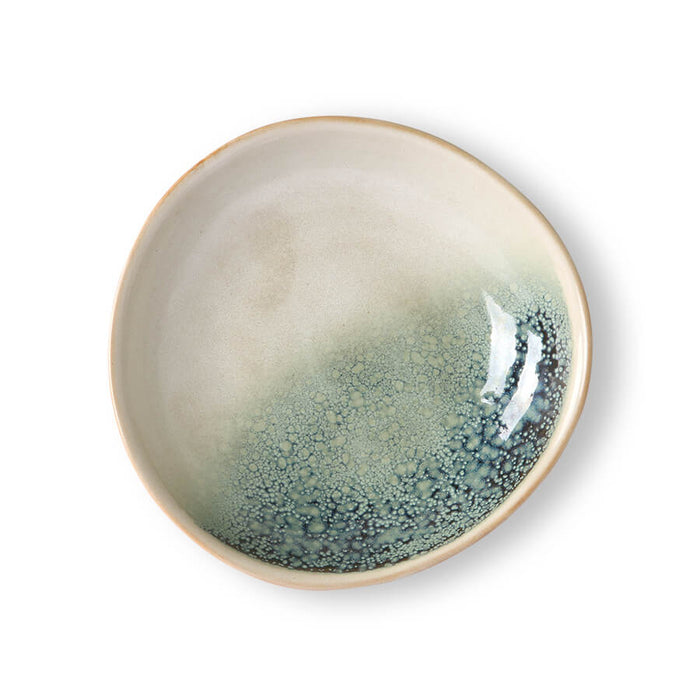 almost eye shaped plate with white and blotchy blue green hkliving plates