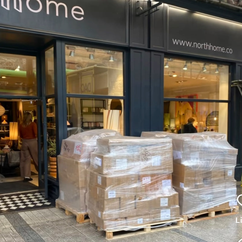 pallets of new stock arriving at north home in leeds