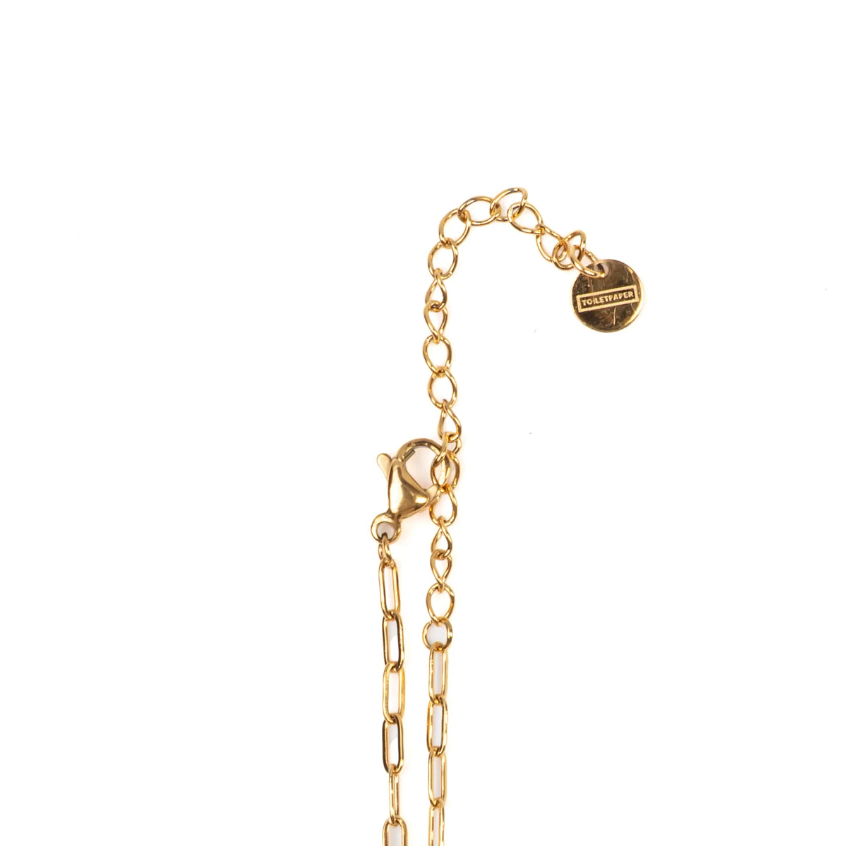 Gold bracelet with a cirular-shaped tag with the TOILETPAPER branding on it on a white background
