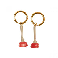 gold hoop earrings with plunger charms, one solid and one outline, by Seletti Toiletpaper
