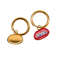 Seletti Toiletpaper SHIT dangling earrings in gold with red lips and blue lettering, 14mm
