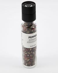 Nicolas Vahé Mixed Blend pepper mill angled view showing colourful peppercorns through glass