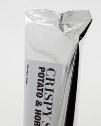 Close-up of the Nicolas Vahé potato and horseradish crispy snack packet