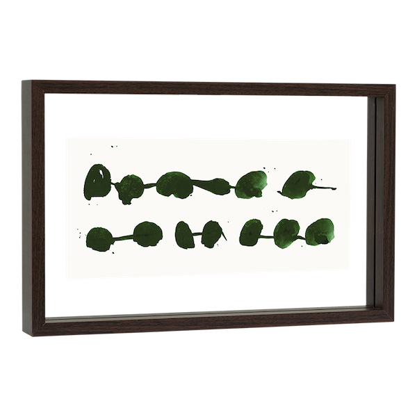 angled view of walnut floating frame by Urban Nature Culture showing depth and glass layers