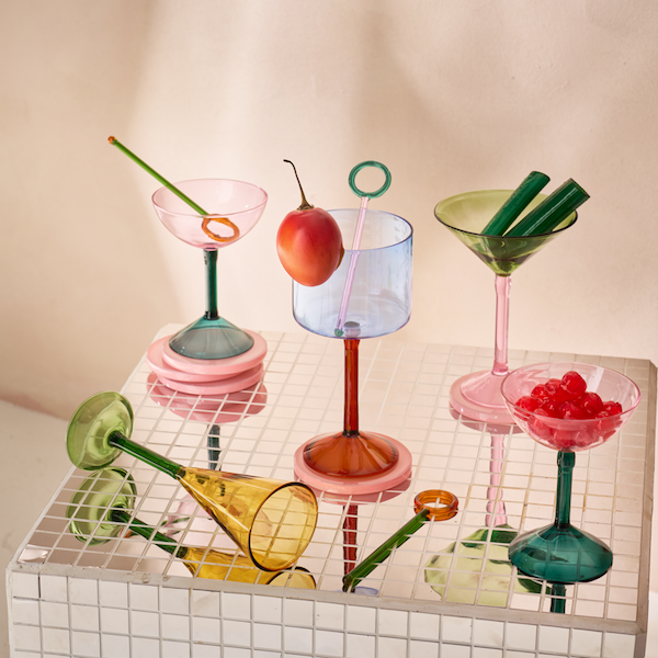 colourful assortment of cocktail glasses including blue urban nature culture gin-tonic glass
