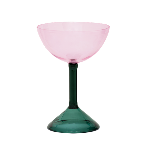 pink coupe cocktail glass with green stem by Urban Nature Culture