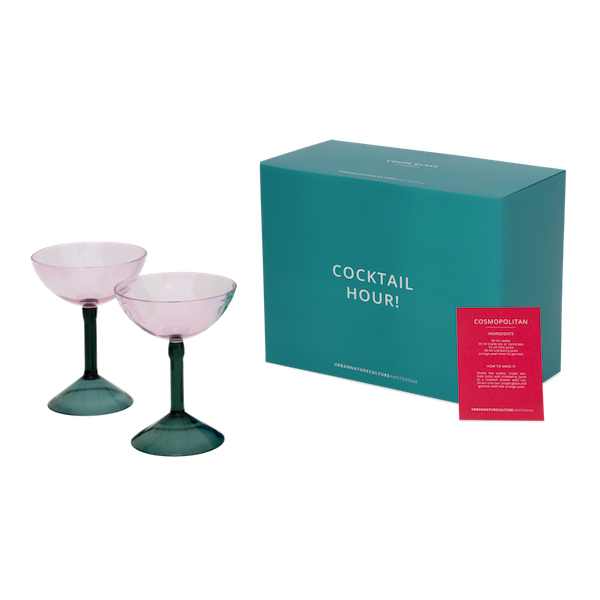 set of two pink coupe glasses with green stems in teal cocktail hour gift box
