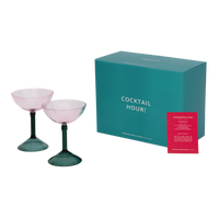 set of two pink coupe glasses with green stems in teal cocktail hour gift box