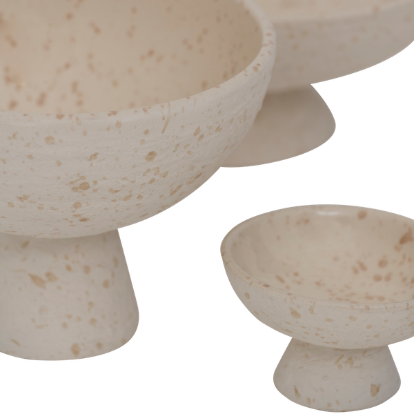 close-up of speckled texture on white bolle pedestal bowl