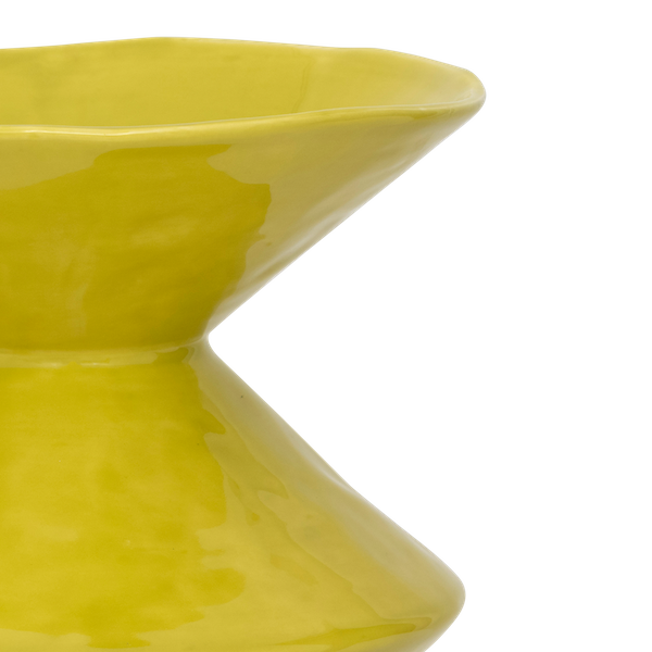 side detail of sculptural silhouette on yellow Zale vase
