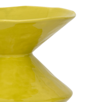 side detail of sculptural silhouette on yellow Zale vase
