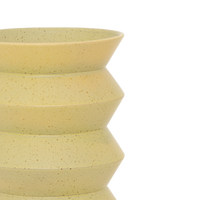 Close-up of Kova vase zigzag silhouette in matte evergreen ceramic