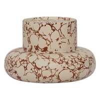 side view of Mukava candle holder showing bulbous ceramic form and marbled finish