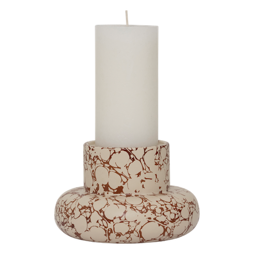 Mukava candle holder by Urban Nature Culture holding a pillar candle, showing marbled print
