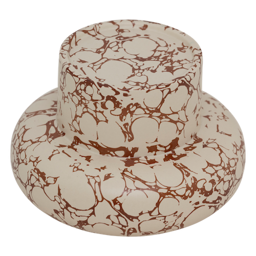 angled view of organic-shaped Mukava ceramic candle holder with decorative marbling
