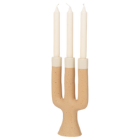 angled view showing organic form of Nox three-arm candle holder
