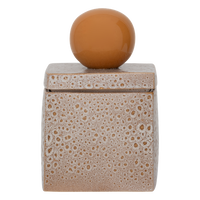 textured natural ceramic storage jar with sculptural orange handle closed