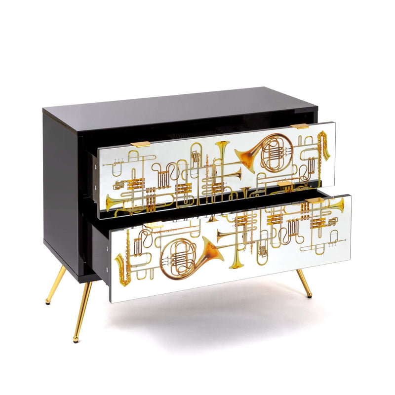 Seletti chest of drawers with golden trumpets design for modern homes