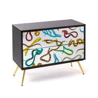 Statement two-drawer chest with surreal snake imagery by Toiletpaper